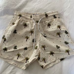 Palm tree print swim trunks